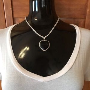 Rhinestone necklace with blue heart pendant